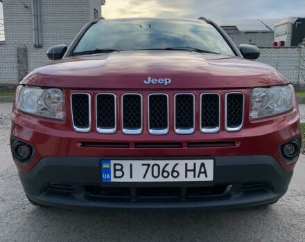 Красный Джип Компас, объемом двигателя 2.4 л и пробегом 170 тыс. км за 11500 $, фото 1 на Automoto.ua