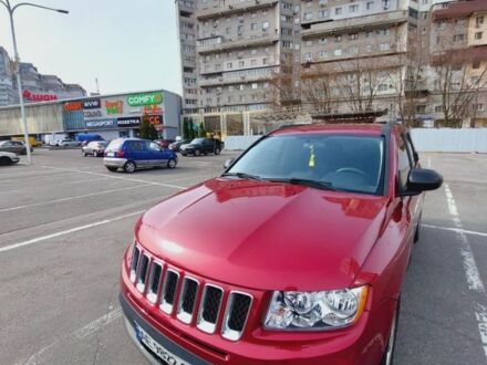 Червоний Джип Compass, об'ємом двигуна 2 л та пробігом 116 тис. км за 7800 $, фото 1 на Automoto.ua