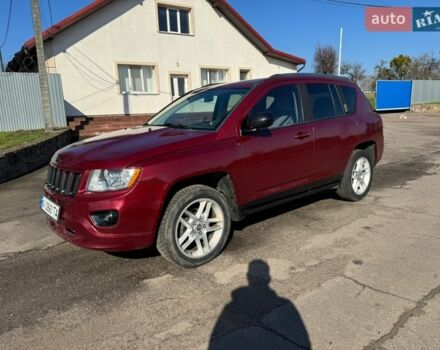Красный Джип Компас, объемом двигателя 2 л и пробегом 244 тыс. км за 9500 $, фото 1 на Automoto.ua