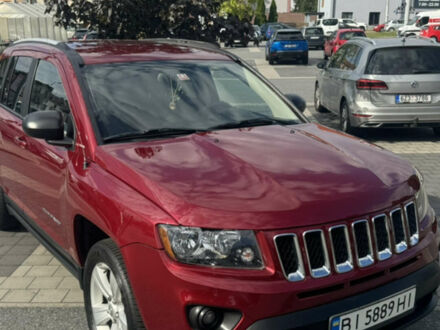 Червоний Джип Compass, об'ємом двигуна 2 л та пробігом 161 тис. км за 9999 $, фото 1 на Automoto.ua