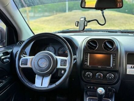 Червоний Джип Compass, об'ємом двигуна 2 л та пробігом 188 тис. км за 9700 $, фото 1 на Automoto.ua