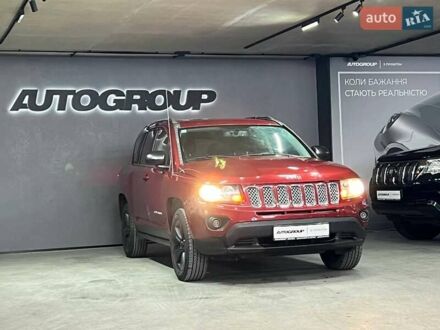 Червоний Джип Compass, об'ємом двигуна 2 л та пробігом 105 тис. км за 11300 $, фото 1 на Automoto.ua
