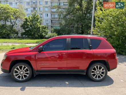 Червоний Джип Compass, об'ємом двигуна 2 л та пробігом 122 тис. км за 10900 $, фото 1 на Automoto.ua