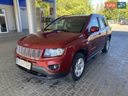 Червоний Джип Compass, об'ємом двигуна 2 л та пробігом 170 тис. км за 9500 $, фото 1 на Automoto.ua