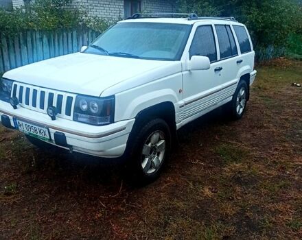 Білий Джип Grand Cherokee, об'ємом двигуна 4 л та пробігом 400 тис. км за 4500 $, фото 4 на Automoto.ua