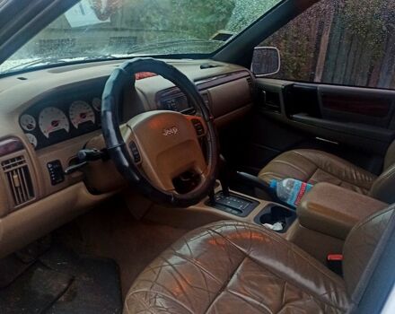 Білий Джип Grand Cherokee, об'ємом двигуна 4 л та пробігом 400 тис. км за 4500 $, фото 3 на Automoto.ua