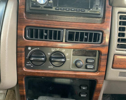 Білий Джип Grand Cherokee, об'ємом двигуна 5.2 л та пробігом 260 тис. км за 6500 $, фото 10 на Automoto.ua