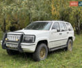 Белый Джип Гранд Чероки, объемом двигателя 5.2 л и пробегом 280 тыс. км за 6500 $, фото 1 на Automoto.ua