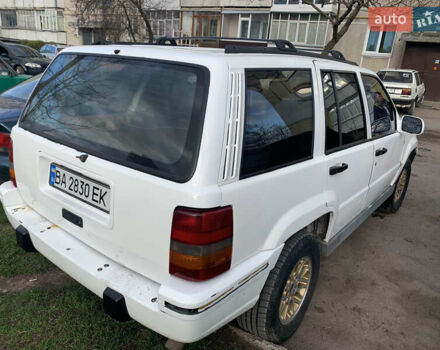 Білий Джип Grand Cherokee, об'ємом двигуна 5.2 л та пробігом 260 тис. км за 6500 $, фото 2 на Automoto.ua