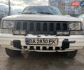 Білий Джип Grand Cherokee, об'ємом двигуна 5.2 л та пробігом 260 тис. км за 6500 $, фото 1 на Automoto.ua