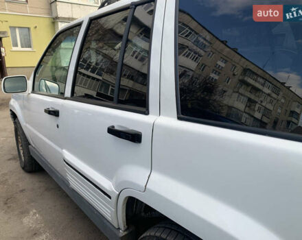 Білий Джип Grand Cherokee, об'ємом двигуна 5.2 л та пробігом 260 тис. км за 6500 $, фото 3 на Automoto.ua