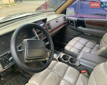 Білий Джип Grand Cherokee, об'ємом двигуна 5.2 л та пробігом 260 тис. км за 6500 $, фото 7 на Automoto.ua