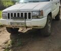 Білий Джип Grand Cherokee, об'ємом двигуна 5.2 л та пробігом 400 тис. км за 5500 $, фото 1 на Automoto.ua