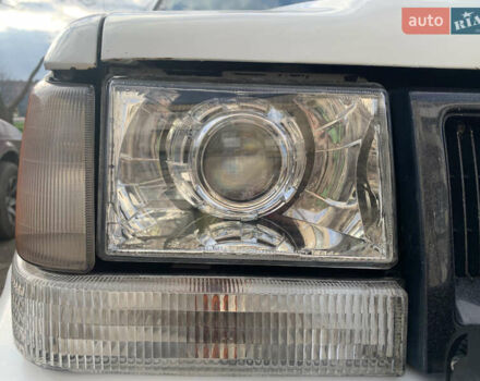 Білий Джип Grand Cherokee, об'ємом двигуна 5.2 л та пробігом 260 тис. км за 6500 $, фото 5 на Automoto.ua