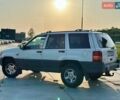 Білий Джип Grand Cherokee, об'ємом двигуна 3.96 л та пробігом 334 тис. км за 4449 $, фото 1 на Automoto.ua