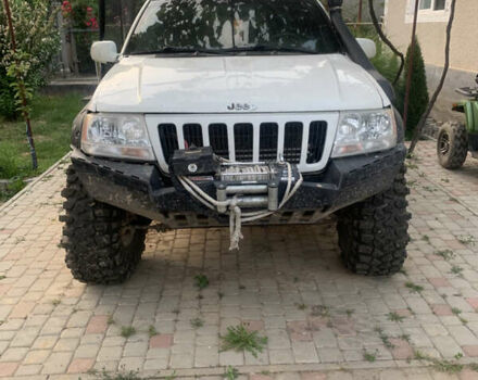 Білий Джип Grand Cherokee, об'ємом двигуна 4.7 л та пробігом 245 тис. км за 12500 $, фото 2 на Automoto.ua