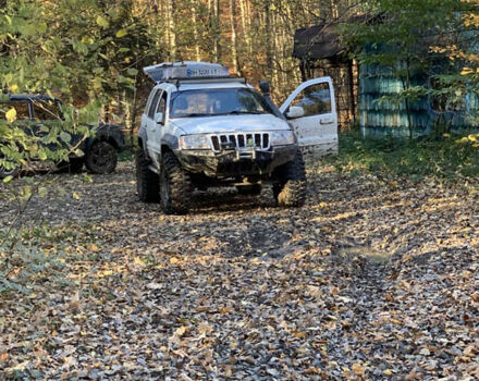 Білий Джип Grand Cherokee, об'ємом двигуна 4.7 л та пробігом 245 тис. км за 12500 $, фото 11 на Automoto.ua