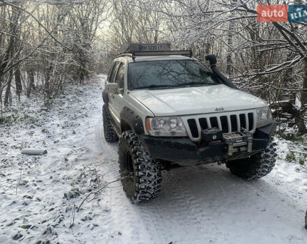 Білий Джип Grand Cherokee, об'ємом двигуна 4.7 л та пробігом 245 тис. км за 12500 $, фото 10 на Automoto.ua