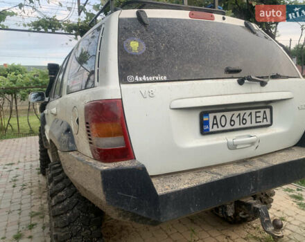 Білий Джип Grand Cherokee, об'ємом двигуна 4.7 л та пробігом 245 тис. км за 12500 $, фото 1 на Automoto.ua