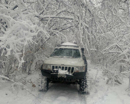 Білий Джип Grand Cherokee, об'ємом двигуна 4.7 л та пробігом 245 тис. км за 12500 $, фото 7 на Automoto.ua