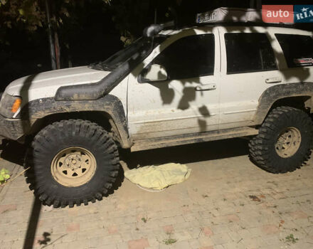 Білий Джип Grand Cherokee, об'ємом двигуна 4.7 л та пробігом 245 тис. км за 12500 $, фото 14 на Automoto.ua