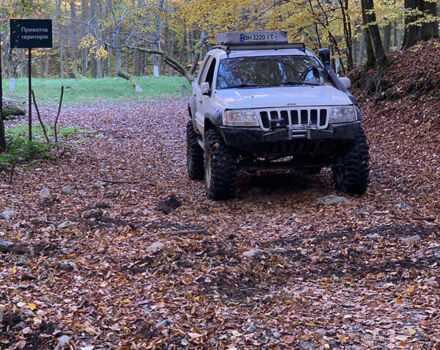 Білий Джип Grand Cherokee, об'ємом двигуна 4.7 л та пробігом 245 тис. км за 12500 $, фото 12 на Automoto.ua