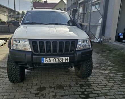 Білий Джип Grand Cherokee, об'ємом двигуна 4 л та пробігом 285 тис. км за 2777 $, фото 5 на Automoto.ua