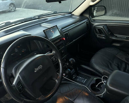 Білий Джип Grand Cherokee, об'ємом двигуна 3.96 л та пробігом 360 тис. км за 5599 $, фото 23 на Automoto.ua