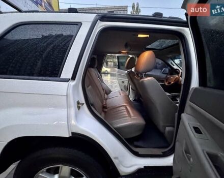 Белый Джип Гранд Чероки, объемом двигателя 4.7 л и пробегом 228 тыс. км за 7400 $, фото 69 на Automoto.ua