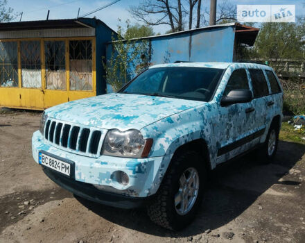 Білий Джип Grand Cherokee, об'ємом двигуна 3 л та пробігом 257 тис. км за 8000 $, фото 1 на Automoto.ua