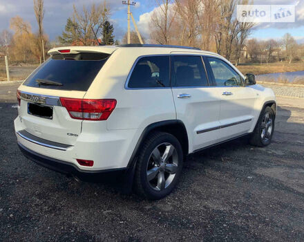 Білий Джип Grand Cherokee, об'ємом двигуна 3 л та пробігом 165 тис. км за 17500 $, фото 2 на Automoto.ua