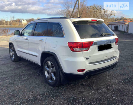 Білий Джип Grand Cherokee, об'ємом двигуна 3 л та пробігом 165 тис. км за 17500 $, фото 1 на Automoto.ua