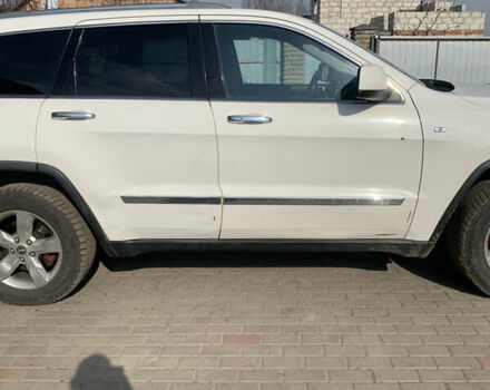 Білий Джип Grand Cherokee, об'ємом двигуна 2.99 л та пробігом 258 тис. км за 15000 $, фото 4 на Automoto.ua