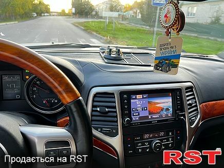 Білий Джип Grand Cherokee, об'ємом двигуна 3.6 л та пробігом 178 тис. км за 15500 $, фото 3 на Automoto.ua