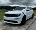 Білий Джип Grand Cherokee, об'ємом двигуна 6.4 л та пробігом 130 тис. км за 12800 $, фото 1 на Automoto.ua