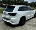 Білий Джип Grand Cherokee, об'ємом двигуна 6.4 л та пробігом 130 тис. км за 12800 $, фото 5 на Automoto.ua