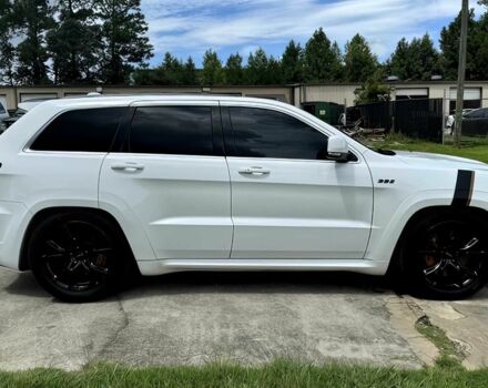 Білий Джип Grand Cherokee, об'ємом двигуна 6.4 л та пробігом 130 тис. км за 12800 $, фото 4 на Automoto.ua