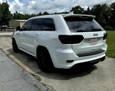 Білий Джип Grand Cherokee, об'ємом двигуна 6.4 л та пробігом 130 тис. км за 12800 $, фото 7 на Automoto.ua