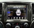 Білий Джип Grand Cherokee, об'ємом двигуна 6.4 л та пробігом 130 тис. км за 12800 $, фото 11 на Automoto.ua