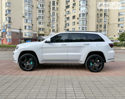 Білий Джип Grand Cherokee, об'ємом двигуна 5.7 л та пробігом 84 тис. км за 35000 $, фото 24 на Automoto.ua