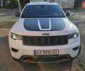 Белый Джип Гранд Чероки, объемом двигателя 5.65 л и пробегом 113 тыс. км за 32900 $, фото 1 на Automoto.ua