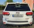 Белый Джип Гранд Чероки, объемом двигателя 5.65 л и пробегом 113 тыс. км за 32900 $, фото 2 на Automoto.ua