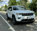 Білий Джип Grand Cherokee, об'ємом двигуна 5.65 л та пробігом 108 тис. км за 26700 $, фото 2 на Automoto.ua