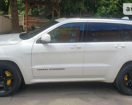 Білий Джип Grand Cherokee, об'ємом двигуна 6.4 л та пробігом 64 тис. км за 60900 $, фото 2 на Automoto.ua