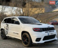Білий Джип Grand Cherokee, об'ємом двигуна 6.4 л та пробігом 196 тис. км за 38000 $, фото 2 на Automoto.ua