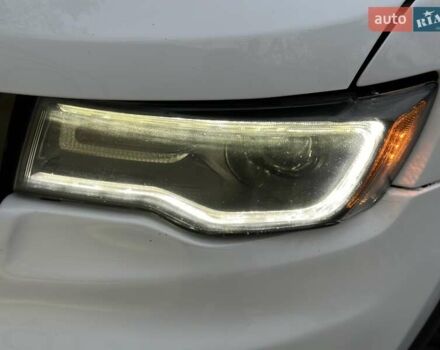 Белый Джип Гранд Чероки, объемом двигателя 5.85 л и пробегом 188 тыс. км за 25900 $, фото 4 на Automoto.ua