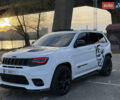 Білий Джип Grand Cherokee, об'ємом двигуна 6.4 л та пробігом 196 тис. км за 38000 $, фото 3 на Automoto.ua