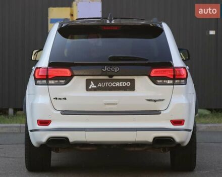 Белый Джип Гранд Чероки, объемом двигателя 5.65 л и пробегом 80 тыс. км за 35900 $, фото 5 на Automoto.ua
