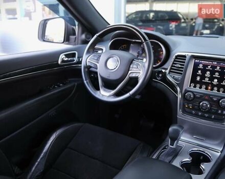 Белый Джип Гранд Чероки, объемом двигателя 5.65 л и пробегом 80 тыс. км за 35900 $, фото 12 на Automoto.ua