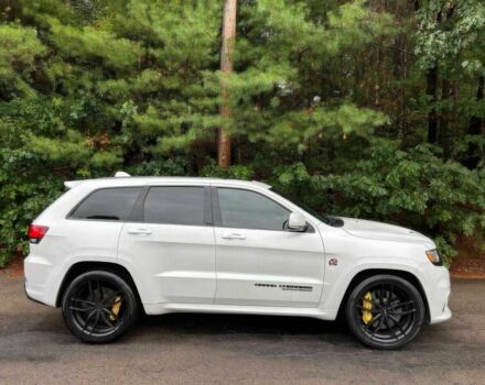 Белый Джип Гранд Чероки, объемом двигателя 6.2 л и пробегом 31 тыс. км за 13200 $, фото 7 на Automoto.ua